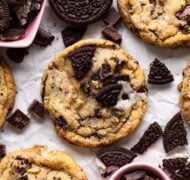 oreo chocolate chip cookies on parchment up close.