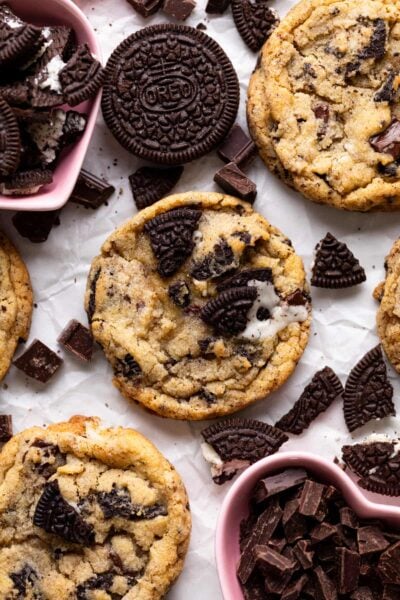 oreo chocolate chip cookies on parchment up close.