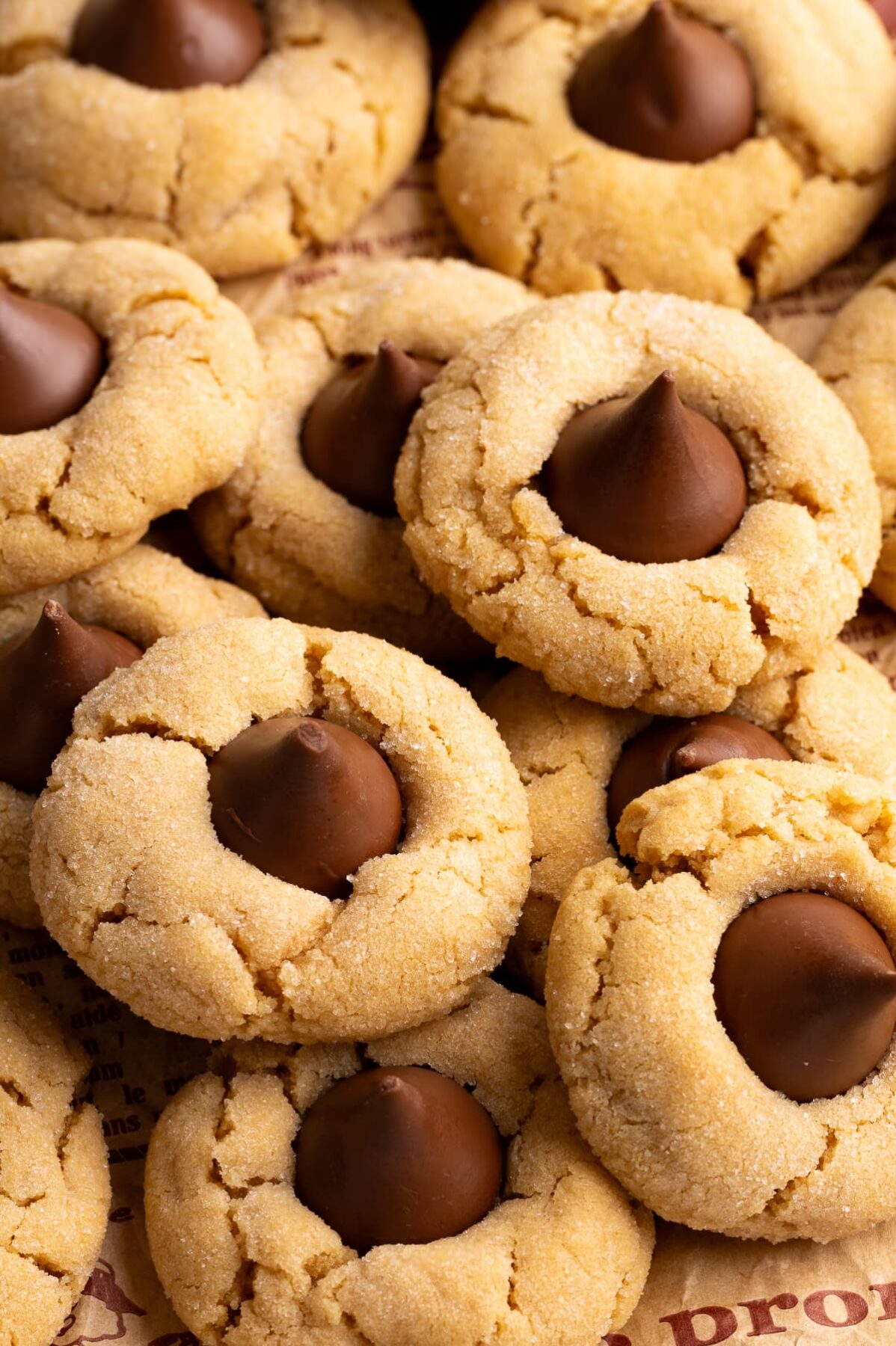 peanut butter blossoms baked in a pile.