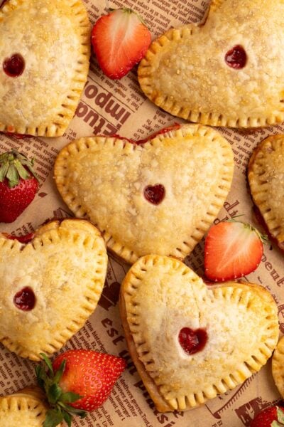 strawberry hand pies on parchment up close.