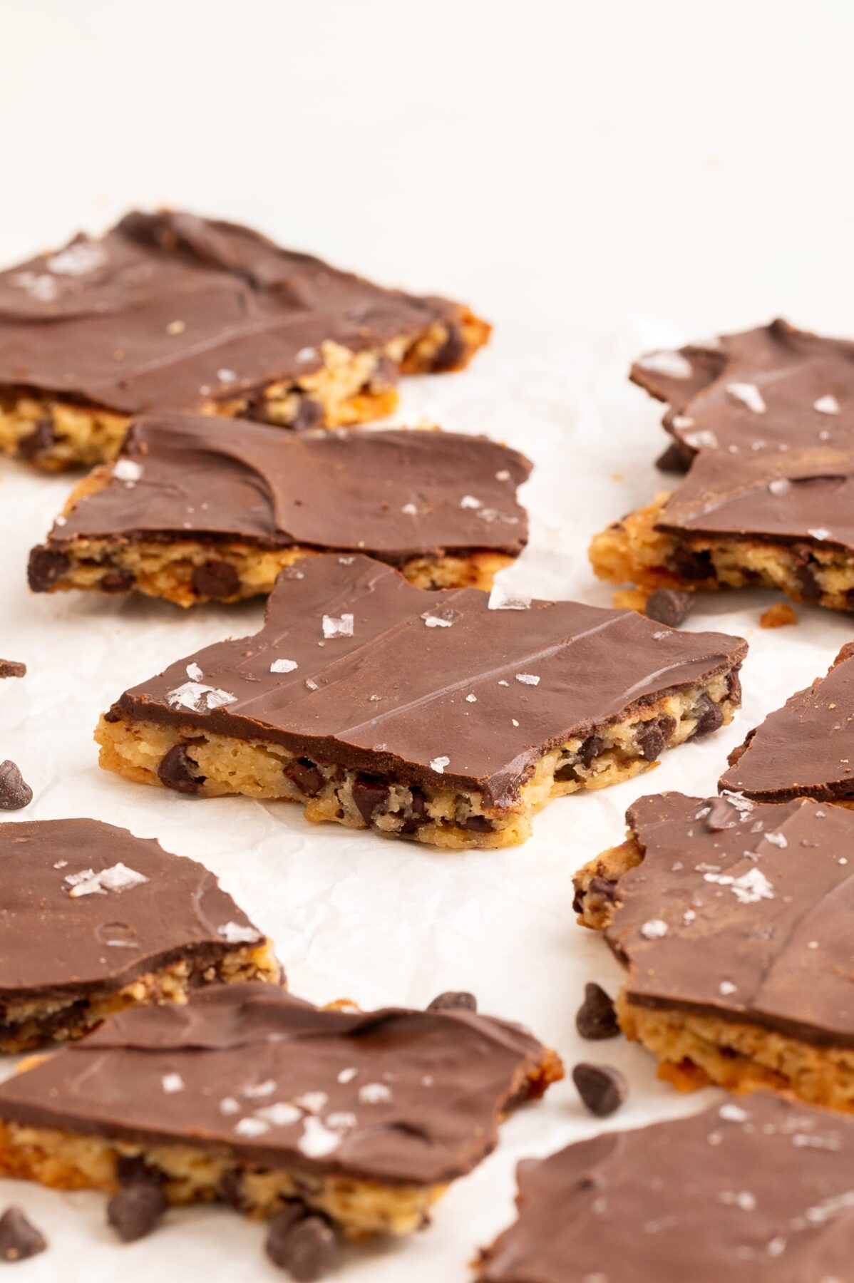 cookie brittle with chocolate and sea salt on parchment.