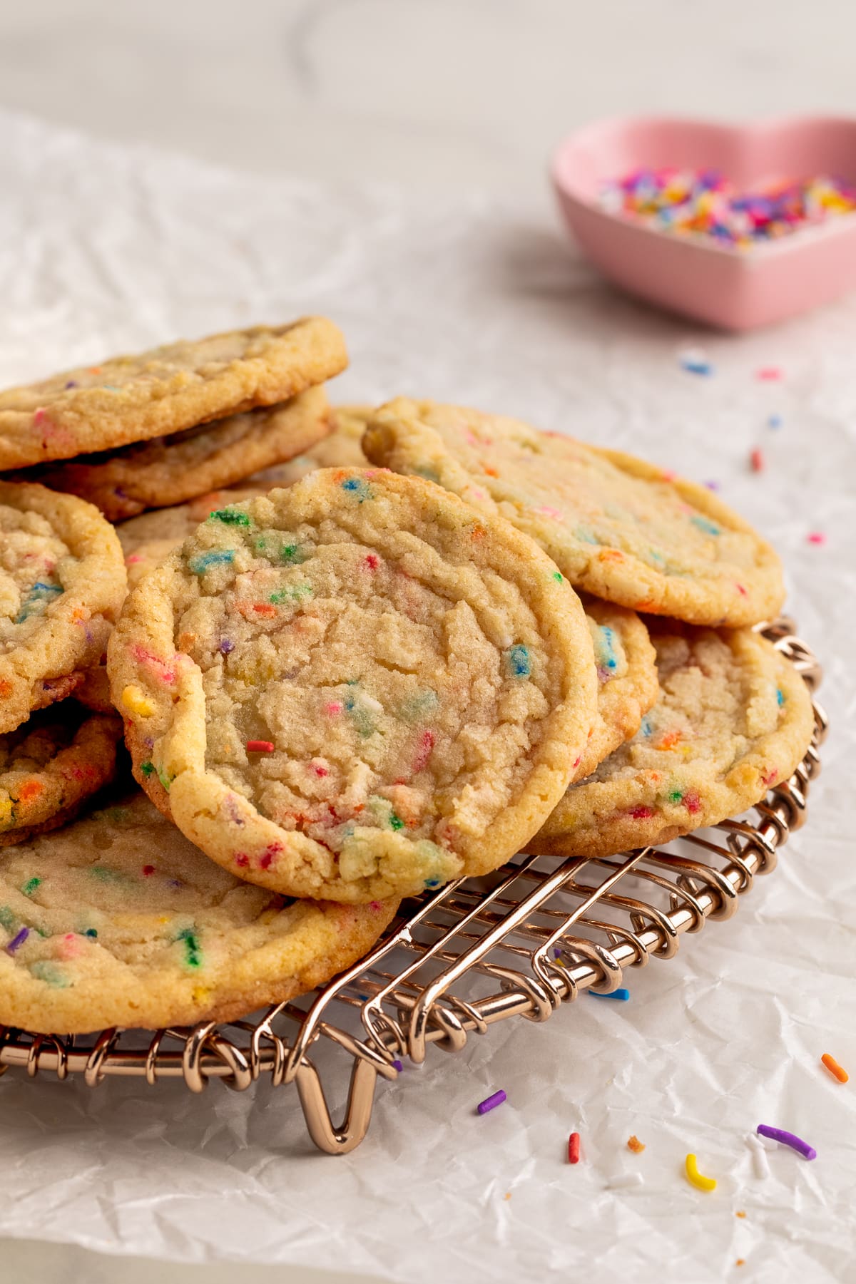 funfetti cookies on cooling rack.