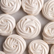 meringue cookies on parchment.