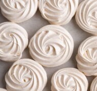 meringue cookies on parchment.