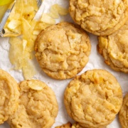 potato chip cookies and potato chips on parchment paper.