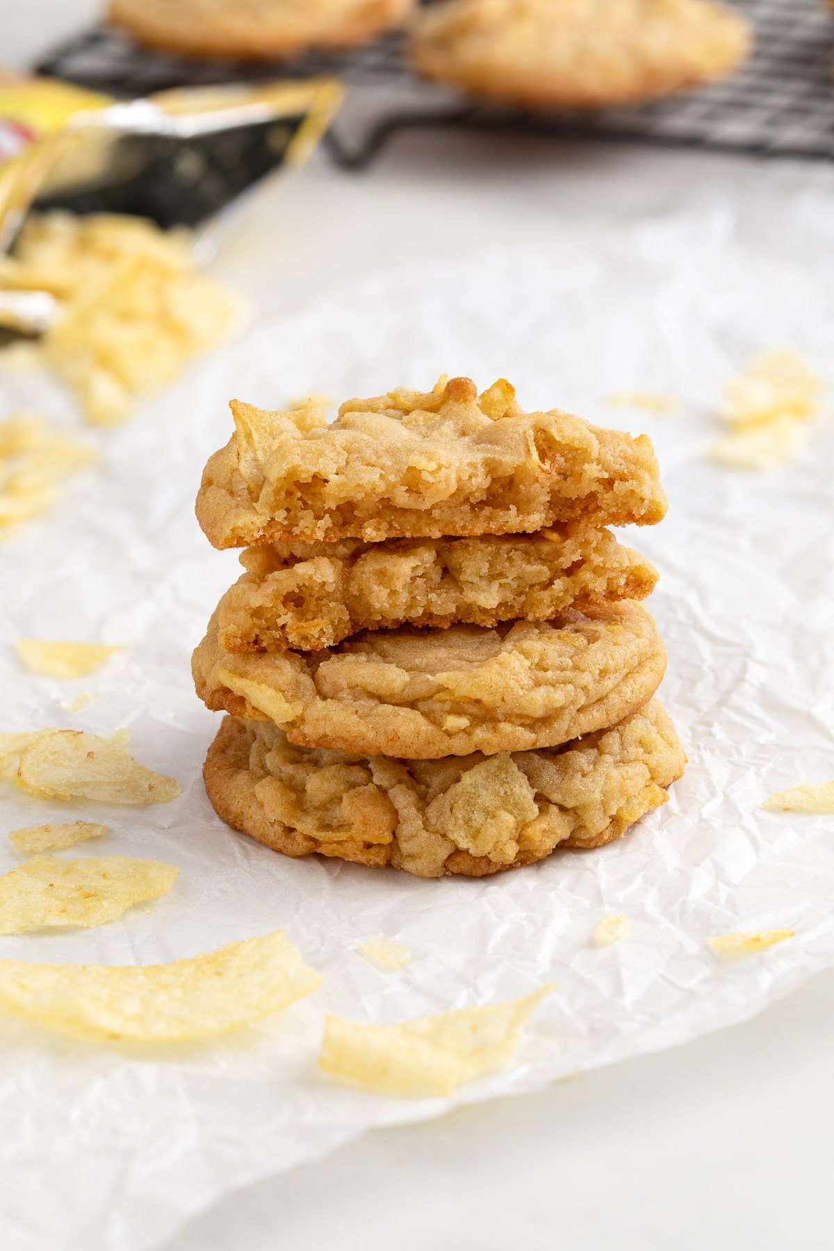 potato chip cookie stacked on parchment.