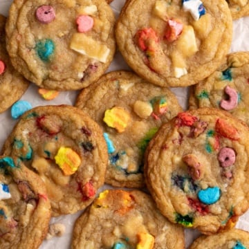 lucky charms cookies piled on parchment.