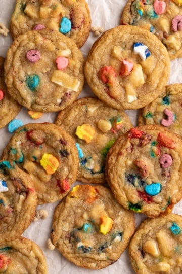 lucky charms cookies piled on parchment.