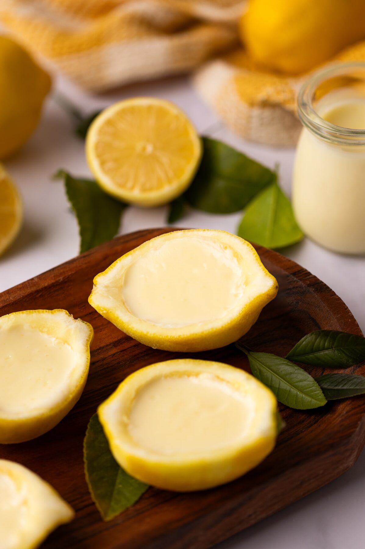 lemon posset in lemon halves. 