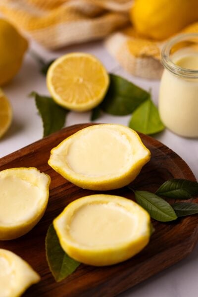 lemon posset in lemon halves.