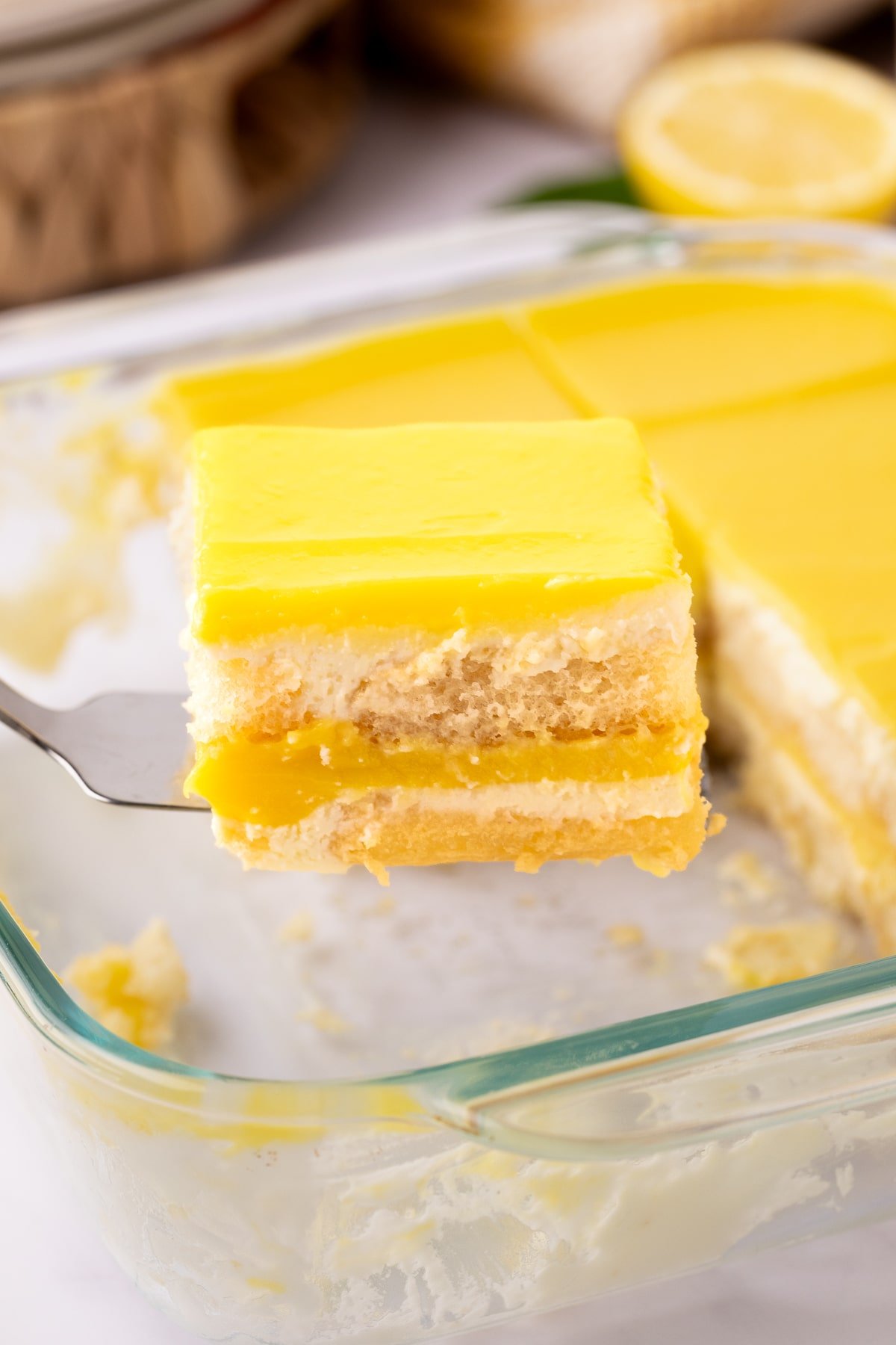 slice of lemon tiramisu in serving dish.