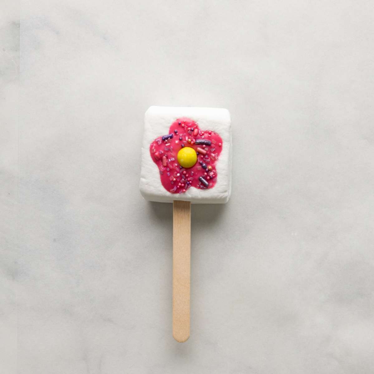 fully decorated flower marshmallow pop.